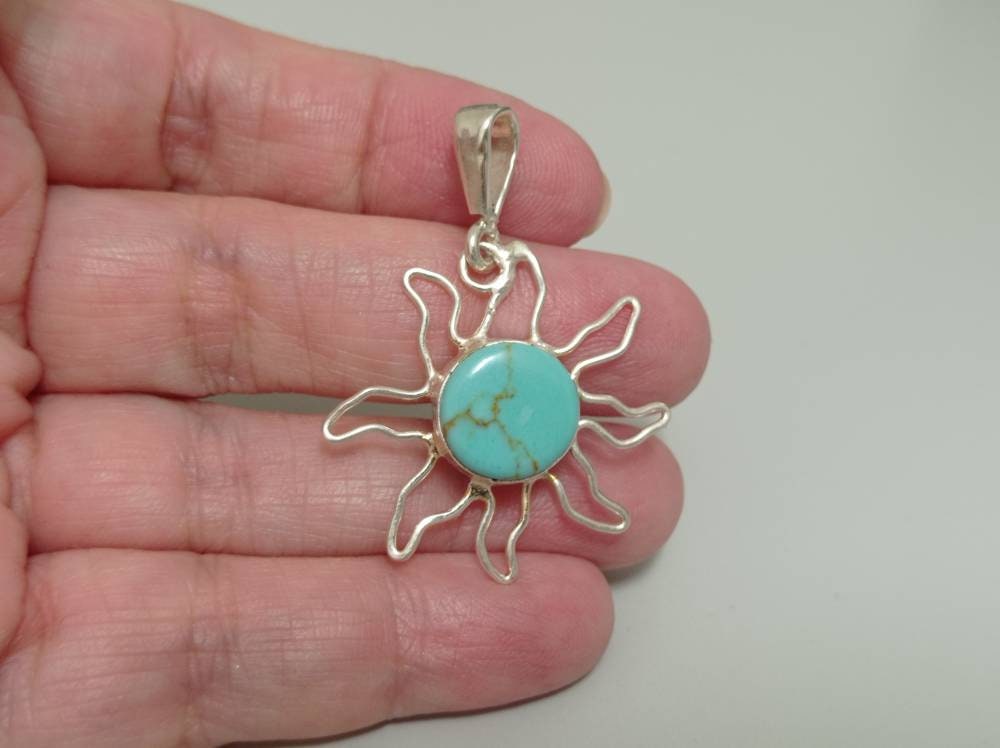 Handcrafted Turquoise Sun Pendant: Boho Chic Artisan Jewelry from Taxco, Mexico - Lightweight Cosmic Design