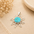 Handcrafted Turquoise Sun Pendant: Boho Chic Artisan Jewelry from Taxco, Mexico - Lightweight Cosmic Design